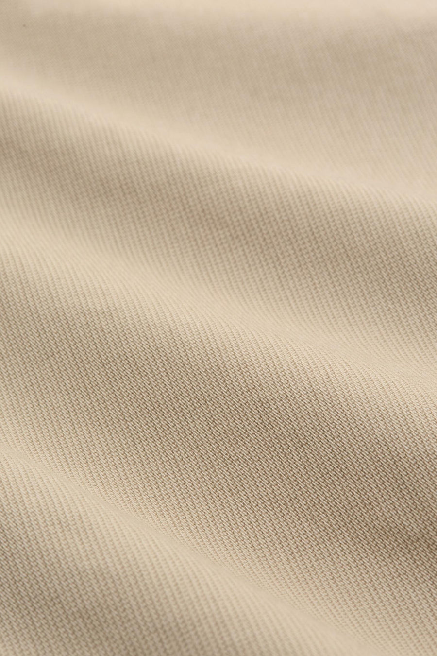 Bermuda beige par Tom Tailor, en tissu texturé avec des plis subtils.