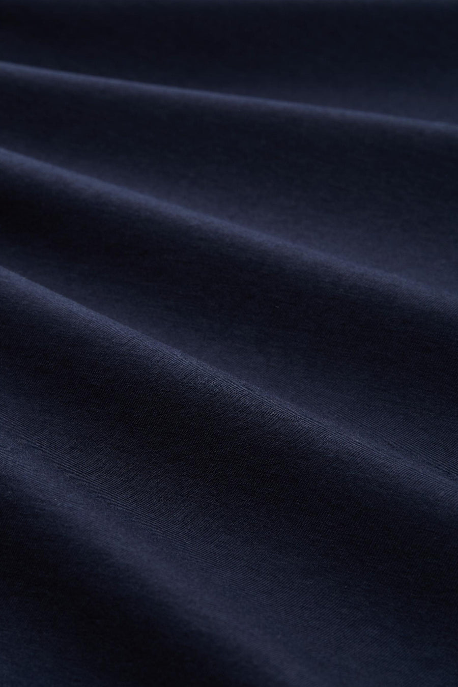 T-shirt bleu à manches courtes de Tom Tailor, en tissu texturé avec des plis délicats.