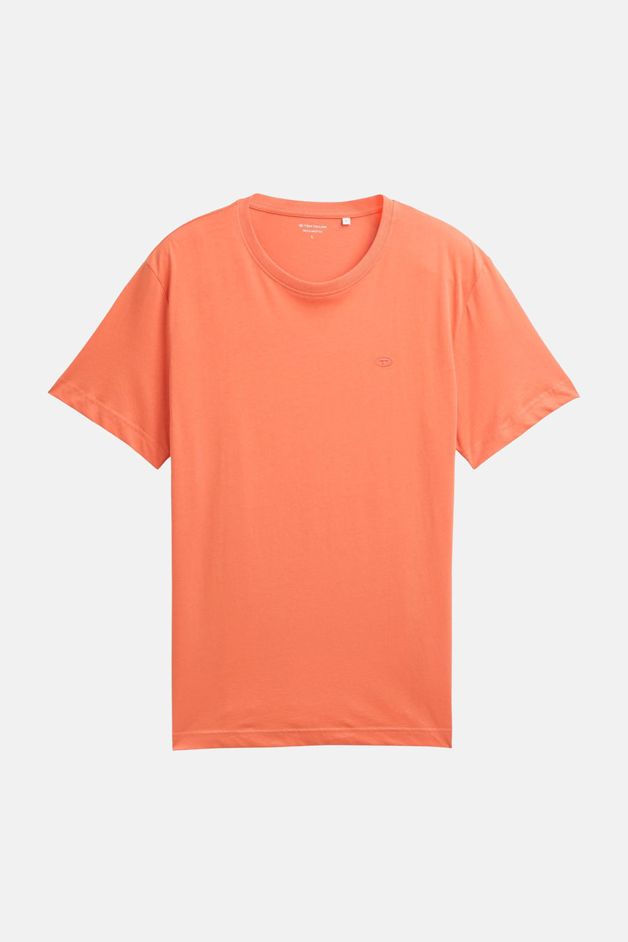 T-shirt à manches courtes corail de Tom Tailor, uni avec un logo discret sur la poitrine.
