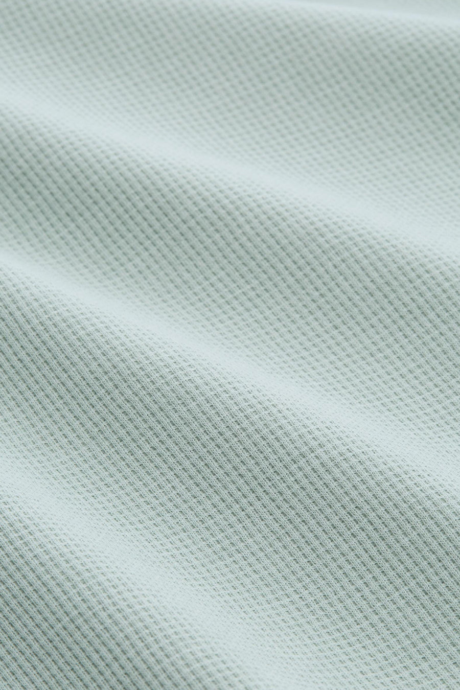 T-shirt à manches courtes vert de Tom Tailor, en maille gaufrée texturée avec des plis doux.