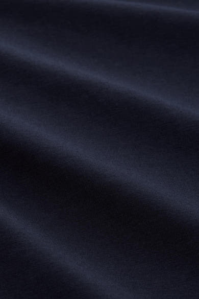 Blauwe polo met korte mouwen van Tom Tailor, van getextureerde stof met subtiele plooien.