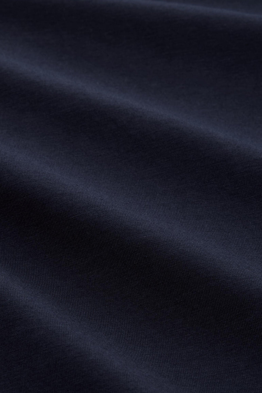 Blauwe polo met korte mouwen van Tom Tailor, van getextureerde stof met subtiele plooien.