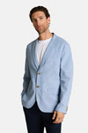 Blazer bleu clair de Tom Tailor, texturé, avec deux boutons marron et poches plaquées.