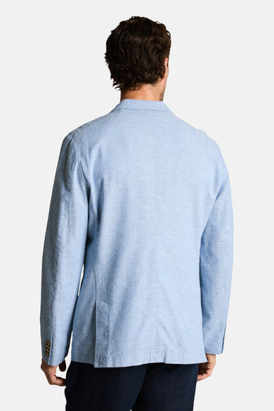 Blazer bleu de Tom Tailor en tissu texturé, vu de dos avec une fente arrière et des boutons aux manches.