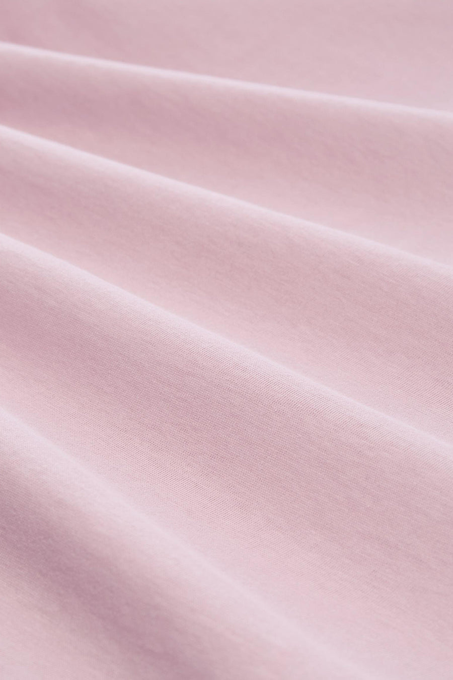 Top uni manches courtes rose de Tom Tailor, en tissu doux avec des plis et une texture de maille fine.
