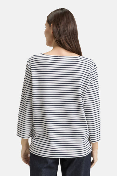 T-shirt à manches longues rayé blanc et bleu marine de Tom Tailor, sur un mannequin vu de dos.