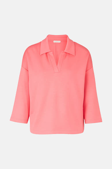Polo corail de Tom Tailor avec col classique et manches trois-quarts amples.