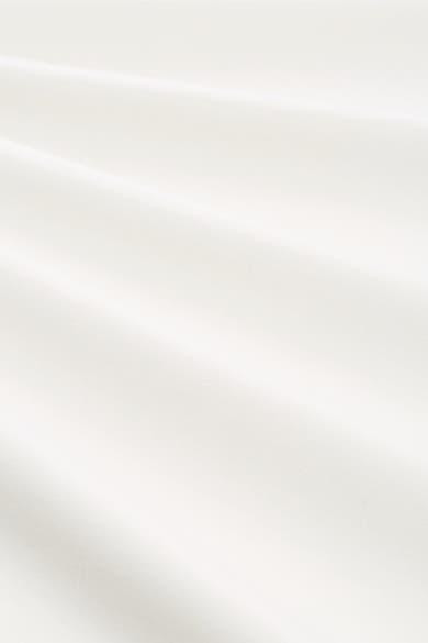 T-shirt blanc de Tom Tailor avec des plis doux et une texture subtile.
