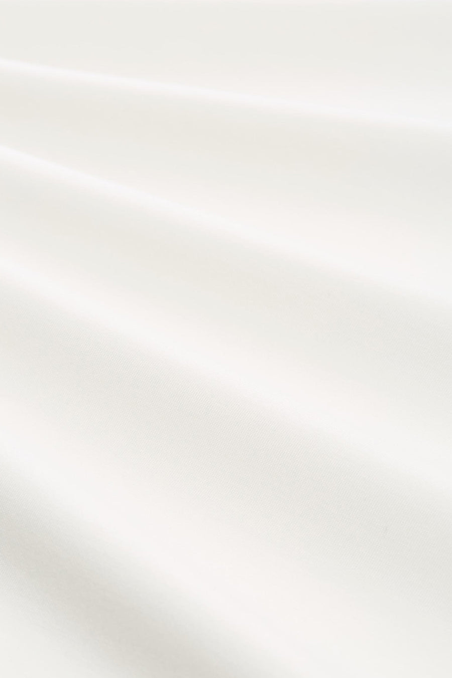 T-shirt blanc de Tom Tailor avec des plis doux et une texture subtile.