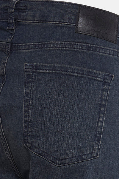 Jean skinny bleu d'OPUS, avec une poche arrière et un empiècement en cuir à la taille.