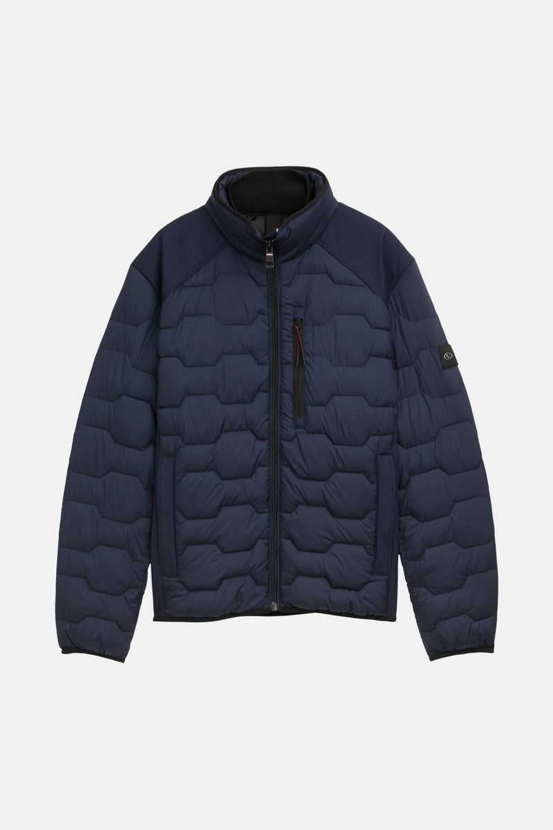 Veste courte bleu marine de Tom Tailor avec motif matelassé hexagonal et empiècements texturés.