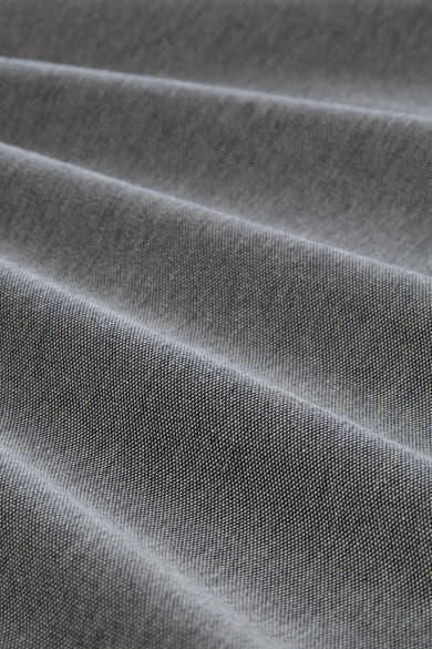 Polo gris en tissu piqué de Tom Tailor avec des plis doux.