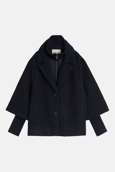 Navy blue textured poncho by Tom Tailor with ribbed collar and cuffs, front buttons, and soft bouclé fabric, shown in front view.