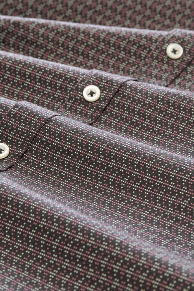 Grey long-sleeve shirt with pink and white geometric pattern, featuring white buttons and a close-up view of the fabric texture.