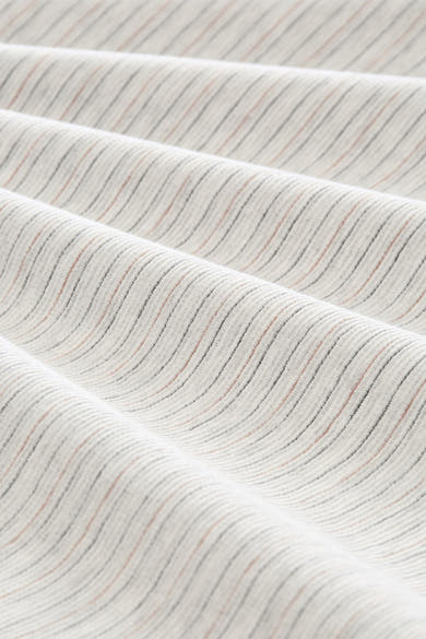 White short-sleeve t-shirt with fine ribbed texture and subtle multicolor stripes, close-up view