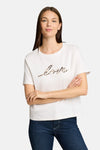 White short-sleeve T-shirt with leopard-print "love" graphic by Tom Tailor, worn with dark blue jeans, front view