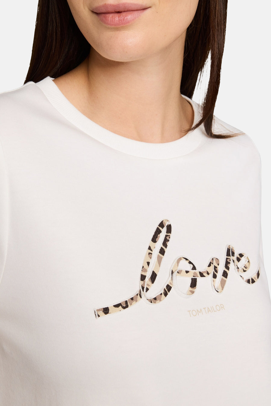 White short-sleeve T-shirt by TOM TAILOR with leopard-print "love" appliqué, round neckline, close-up front view