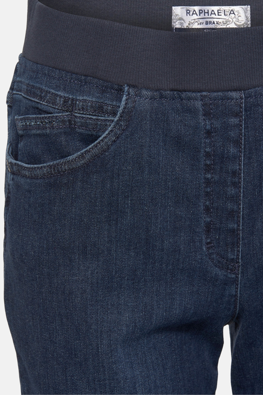 Slim jeans in medium blue denim by Raphaela, with elastic waistband and rounded front pocket.