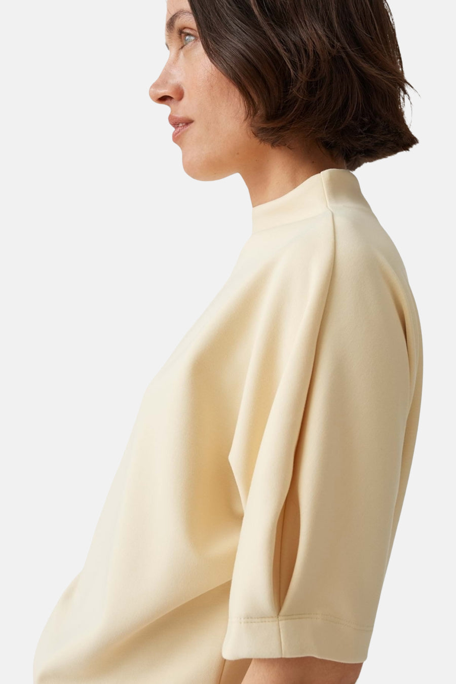 Yellow round-neck sweatshirt by OPUS, side view, soft textured fabric, relaxed fit, short sleeves with ribbed cuffs