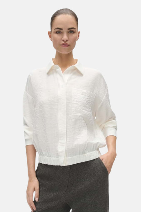 Blouse écrue OPUS à manches longues, avec col chemise, poche poitrine et bas élastiqué