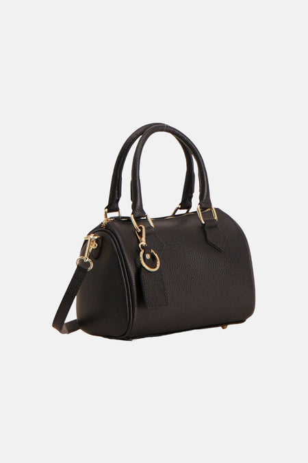 Sac à main noir de Access® en cuir grainé avec bandoulière, poignées rondes et ferrures dorées.