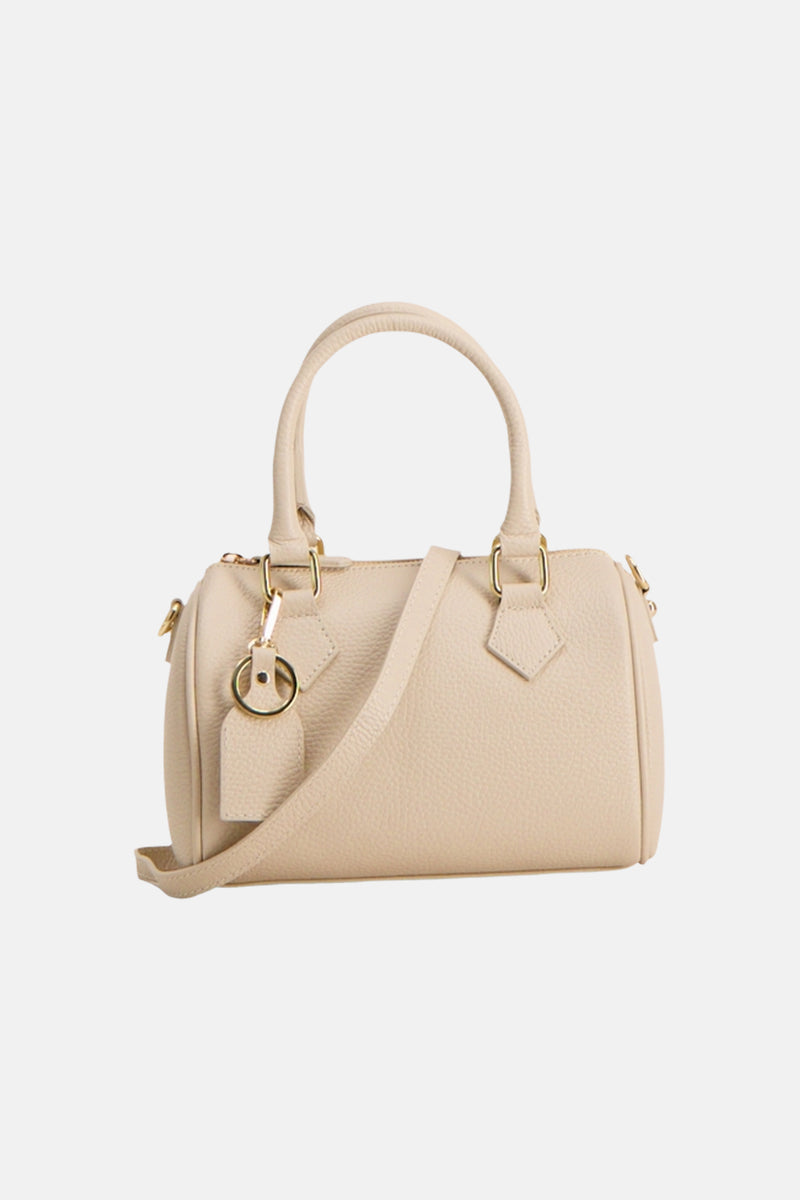 Sac à main écru en cuir grainé de Access®, avec poignées supérieures, une bandoulière amovible et des ferrures dorées.