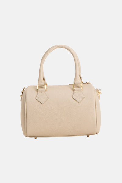 Sac à main écru de Access® en cuir grainé, avec anses supérieures et détails dorés.