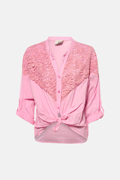 Blouse rose à manches longues de Terra di Siena, avec empiècement en dentelle et détail noué.