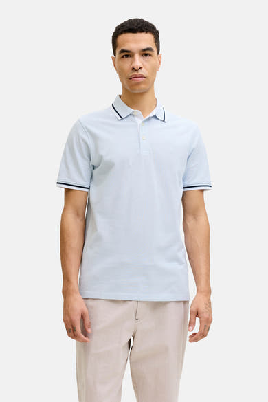 Polo bleu à manches courtes de PREMIUM by JACK & JONES, avec des rayures foncées au col et aux manches.