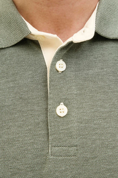 Polo vert à manches courtes de PREMIUM by JACK & JONES, avec boutons et col écru.

