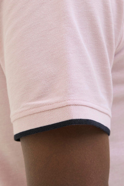 Polo-shirt met rose van PREMIUM by JACK & JONES, met een zwarte streep aan het einde van de mouwen.