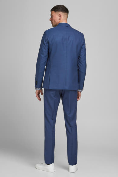 Blauwe blazer van PREMIUM by JACK & JONES, achterzijde, met knopen op de manchetten.