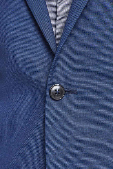 Blauwe blazer van PREMIUM by JACK & JONES, met zwarte knoop en discrete textuur.