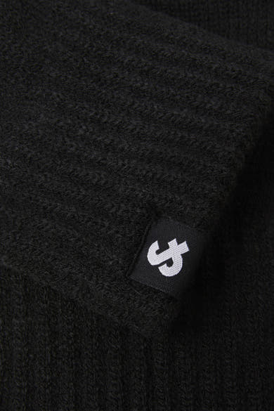 Gants noirs by ACCESSORIES BY JACK & JONES, détail de texture tricotée et étiquette de la marque visible.