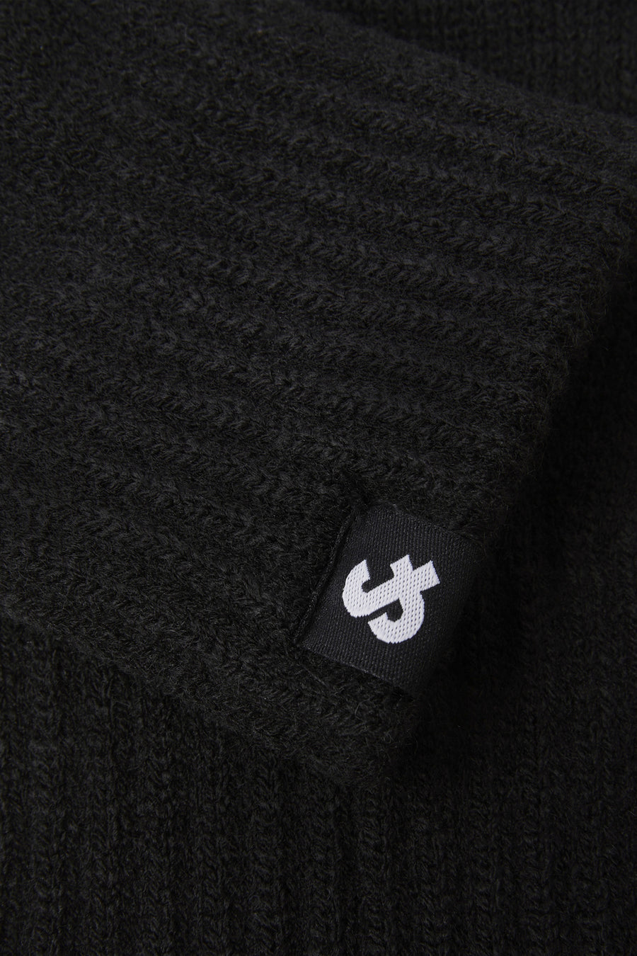 Gants noirs by ACCESSORIES BY JACK & JONES, détail de texture tricotée et étiquette de la marque visible.