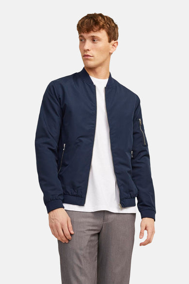 Veste courte bleue de PREMIUM BLUE BY JACK & JONES, avec fermeture éclair et poches zippées.
