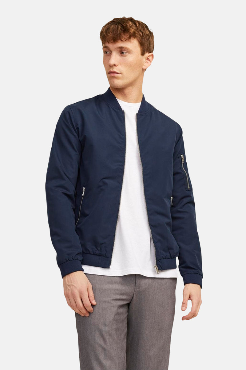 Veste courte bleue de PREMIUM BLUE BY JACK & JONES, avec fermeture éclair et poches zippées.