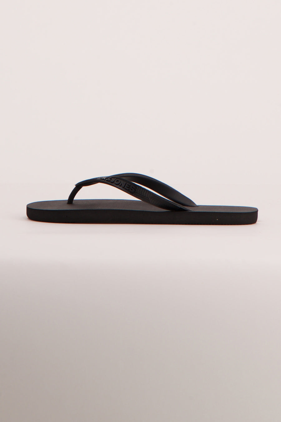 Tongs bleues de ACCESSORIES BY JACK & JONES, vue de côté.