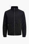 Korte zwarte jas van Jack & Jones met een zilveren ritssluiting.