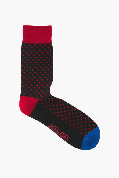 Red and black polka dot sock with blue toe by Jack & Jones, featuring ribbed cuff and red heel, side view