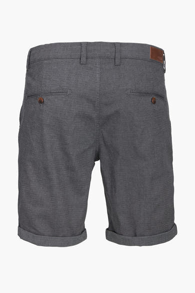 Korte blauwe broek van JACK & JONES JEANS INTELLIGENCE, met achterzakken met knoopsluiting en opgerolde zomen.