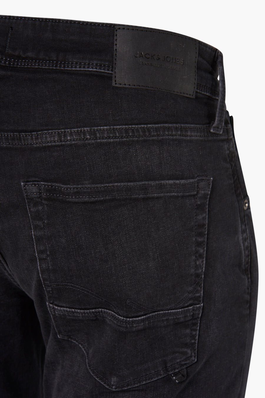 Grijze slim fit jeans van JACK & JONES JEANS INTELLIGENCE met zichtbare achterzak en zwart leren label.