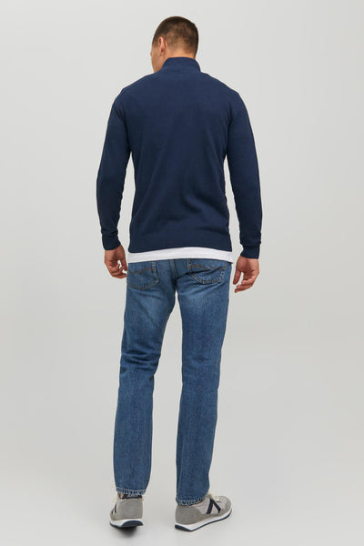 Navy blue knit gilet with ribbed cuffs and hem, back view, worn with jeans and sneakers