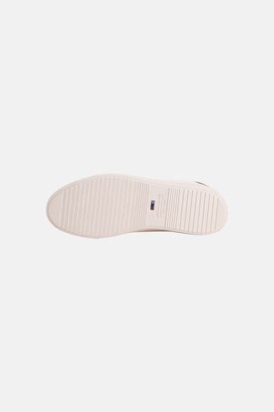 Baskets blanches de Jack & Jones, vue de la semelle striée beige avec le logo imprimé.