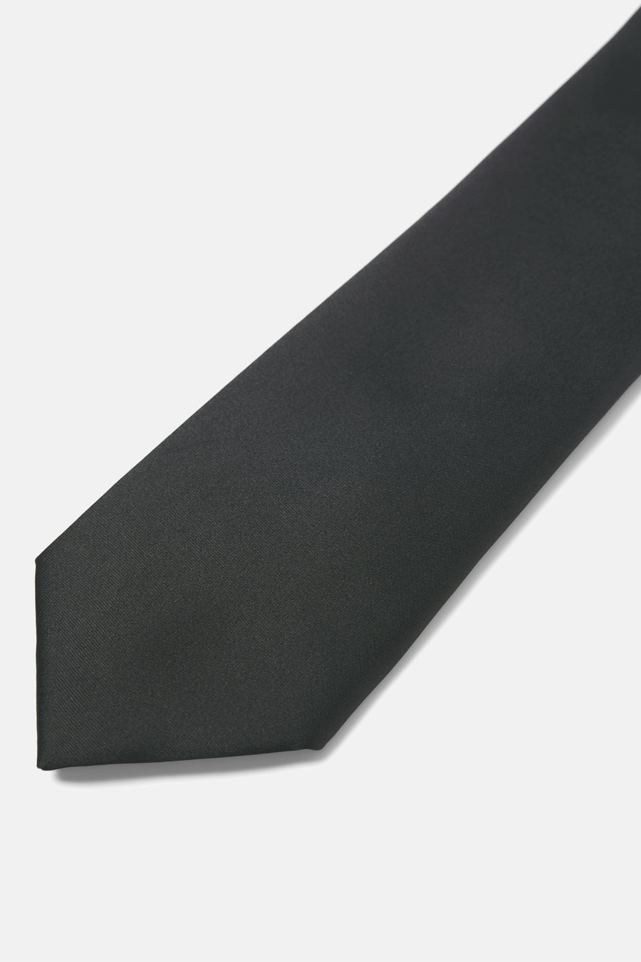 Cravate noire par Accessories by Jack & Jones, en tissu texturé, sur fond clair.