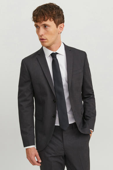 Cravate noire par ACCESSORIES BY JACK & JONES, portée avec une chemise blanche et un costume gris anthracite.