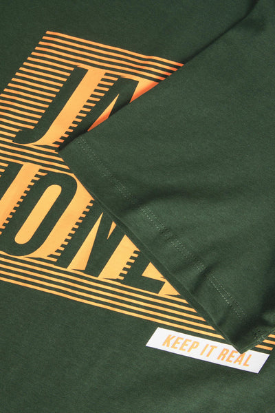 Kaki short-sleeve t-shirt with bold orange graphic print and "KEEP IT REAL" tag, close-up side view