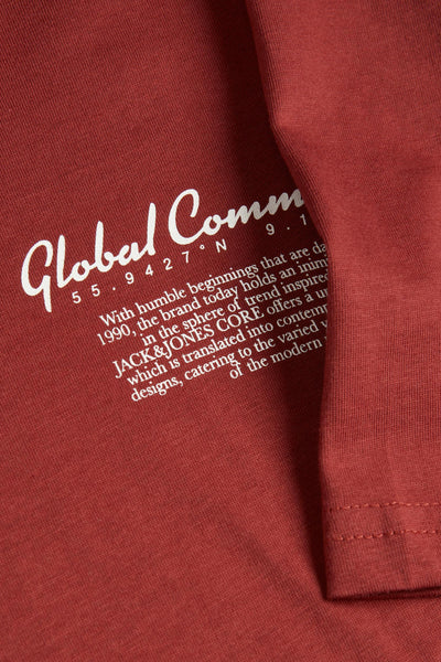 Red short-sleeve t-shirt by JACK&JONES with white script text and coordinates, close-up side view showing ribbed sleeve hem