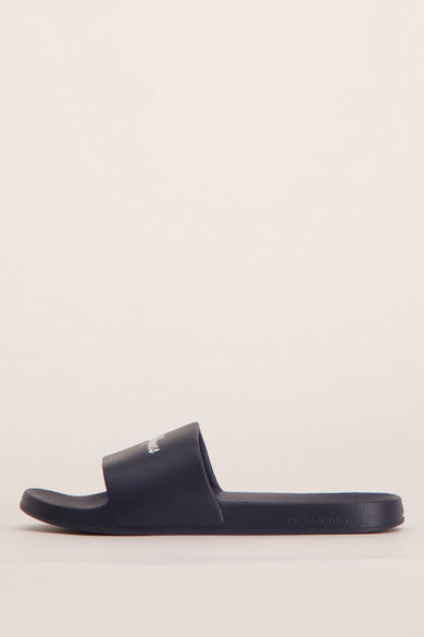 Tongs bleues par ACCESSORIES BY JACK & JONES, avec inscription sur le dessus.