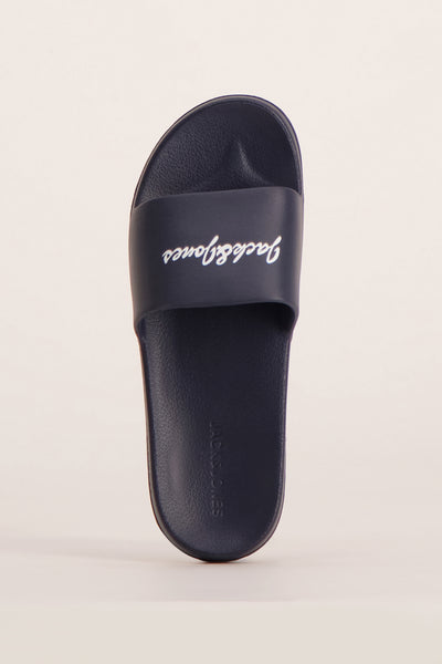 Tongs bleues de ACCESSORIES BY JACK & JONES avec le logo de la marque en blanc.